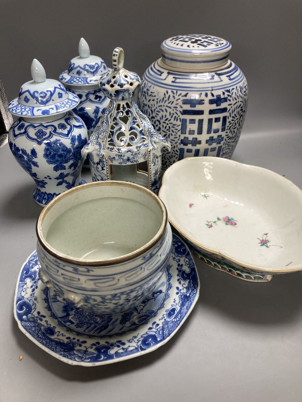A Chinese famille rose dessert dish, 27cm, assorted Chinese blue and white porcelain and a delft ware hanging candle lantern, 26cm